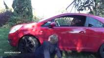 Mistress Cleo smokes and smashes balls with a car