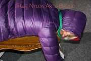 Watching sexy Sonja being tied and gagged with ropes and a cloth gag on a stool wearing a sexy shiny nylon rain pant and a purple down jacket (Pics)