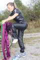 Watch Sandra riding her bike enjoying her shiny nylon Rainwear