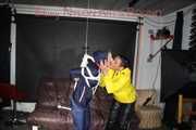 SEXY RONJA being tied and gagged with ropes overhead and a ballgag from SEXY STELLA both wearing sexy shiny nylon rainwear (Pics)