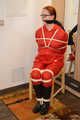 Bondage in  red nylon rainwear