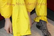 Jill ties, gagges and hoodes herself wearing a shiny yellow down jacket and a yellow rain pants(Pics)