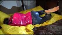 Get an archive Video with Lucy bound and gagged in her shiny nylon downwear