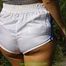 Watch Chloe enjoying her shiny nylon Shorts outside at a sunny Day