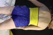 ***NEW MODELL MIA*** wearing a sexy yellow/blue shiny nylon shorts and a yellow top preparing her bed and changing cloths (Pics)