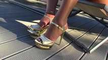Dangling with sexy golden platforms