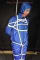 Watching sexy Pia being tied and gagged overhead with ropes and a ballgag wearing a supersexy blue shiny nylon bib overall and a rain jacket (Pics)