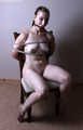 Amanda tied nude on chair