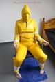 Jill tied and gagged on a chair wearing a yellow rainsuit and coveres with an yellow raincoat with two hoods (Pics)