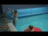 Katharina and Jenny swimming in an indoor pool wearing sexy shiny nylon shorts and bikini-tops (Video)