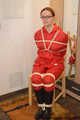 Bondage in  red nylon rainwear