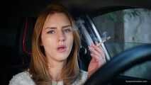 Meet Anastasia in her car while she is smoking two 120mm all white cigarettes