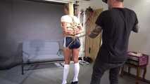 Ms Ungeniert bound, suspendet and whipped at the end, in shiny nylon Shorts 2/2