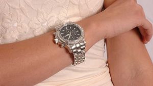 Nelleke wearing a huge steel watch