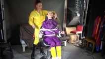 Watching sexy Sandra wearing hot purple shiny nylon rainwear with rubber boots being tied, gagged and hooded from Stella wearing a sexy yellow shiny nylon rainwear with high heels rubber boots (Video)