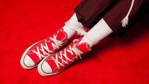 Fetisha in Red Converse High tops