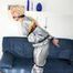 Blond-haired maid tied and gagged with tape wearing a shiny silver PVC sauna suit (Pics)
