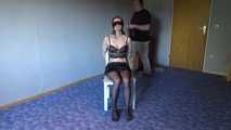 Shelli cuffed and gagged on a chair 1/2