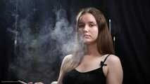 18 aged girl is smoking two 100mm Reds with a lot a nose exhales