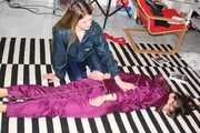 Watching sexy Alina being tied and gagged on the floor from Katharina both wearing sexy shiny nylon rainwear combinations (Pics)