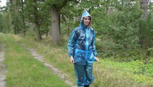 Miss Petra goes for a walk in PVC raingear and rubber boots