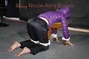 Watching sexy Sonja being tied and gagged with ropes and a cloth gag on a stool wearing a sexy shiny nylon rain pant and a purple down jacket (Pics)