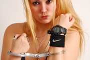 Valery wearing a G-Shock and handcuffs