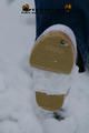 Linda with white clogs in the snow