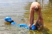 Dana and Asya - Asya is packed in trash bags in water