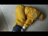 03:20 Min. video with Katharina bound in a yellow rainsuit