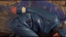 Alina tied, gagged and hooded on a princess bed in an old cellar wearing a shiny blue downwear (Video)