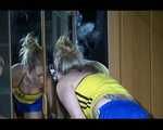 ***NEW MODEL*** Sandra wearing highheels and a sexy blue/yellow shiny nylon shorts and a yellow top during cleaning the mirror (Video)