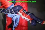 Sexy Sonja wearing a sexy oldschool shiny nylon downbib and donjacket being tied and gagged with ropes overhead (Pics)