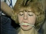 18 YEAR OLD CUTIE FACE TERRI IS MOUTH STUFFED, CLEAVE GAGGED, ROPE GAGGED, CROTCH ROPED, TIED UP WEARING LINGERIE AND BAREFOOT (D56-6)