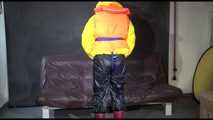 Watching Mara putting on a down jacket, rubber boots and a lifevest (Video)