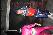 RONJA being tied, gagged and double hooded with ropes and a ballgag from Stella both wearing sexy shiny nylon rainwear (Pics)