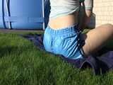 Watch Chloe enjoying the Sun in her Shiny Nylon Shorts