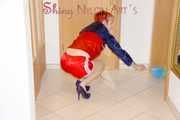 SONJA wearing a sexy red shiny nylon shorts and a red/blue rain jacket cleaning up the flat (Pics)