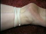 19 Yr OLD CRYSTAL IS CLEAVE GAGGED, SMELLS HER STINKY NYLONS, BAREFOOT, TOE-TIED & HOG-TIED ON THE FLOOR (D56-8)