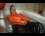 SEXY SANDRA wearing an special orange down jacket and a black down pants during taking a bath playing with water and the downwear (Video)