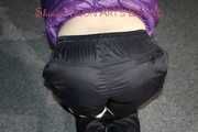 Watching sexy Sonja being tied and gagged with ropes and a cloth gag on a stool wearing a sexy shiny nylon rain pant and a purple down jacket (Pics)