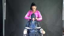 Sexy Ajyana being tied, gagged, hooded and dominated by Stella wearing sexy shiny nylon rainwear on a hairdresser´s chair Part 1 of 2 (Video)