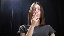 Brunette babe is smoking 100mm cork cigarette