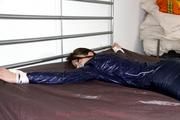 Shelly bound and gagged in shiny nylon clothes
