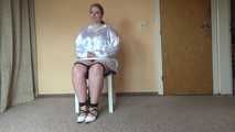 Sandra chairtied and drooling 1/2