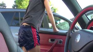 Watch Sandra having a Trip with her Car and doing a Walk in her shiny nylon Shorts