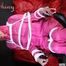 Watching sexy Pia being tied and gagged with ropes and a clothgag on a hairdressers chair wearing a very sexy pink rainwear combination with hood (Pics)