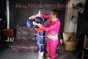 RONJA being tied, gagged and double hooded with ropes and a ballgag from Stella both wearing sexy shiny nylon rainwear (Pics)