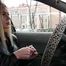 Ekaterina is smoking while driving her car