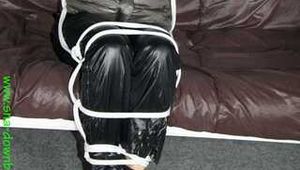 Watch Pia enjoying Bondage in her shiny nylon Downwear